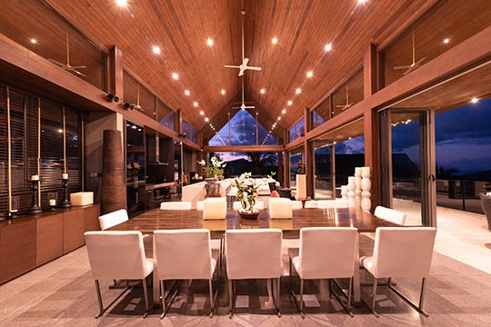 Living and dining areas at night
